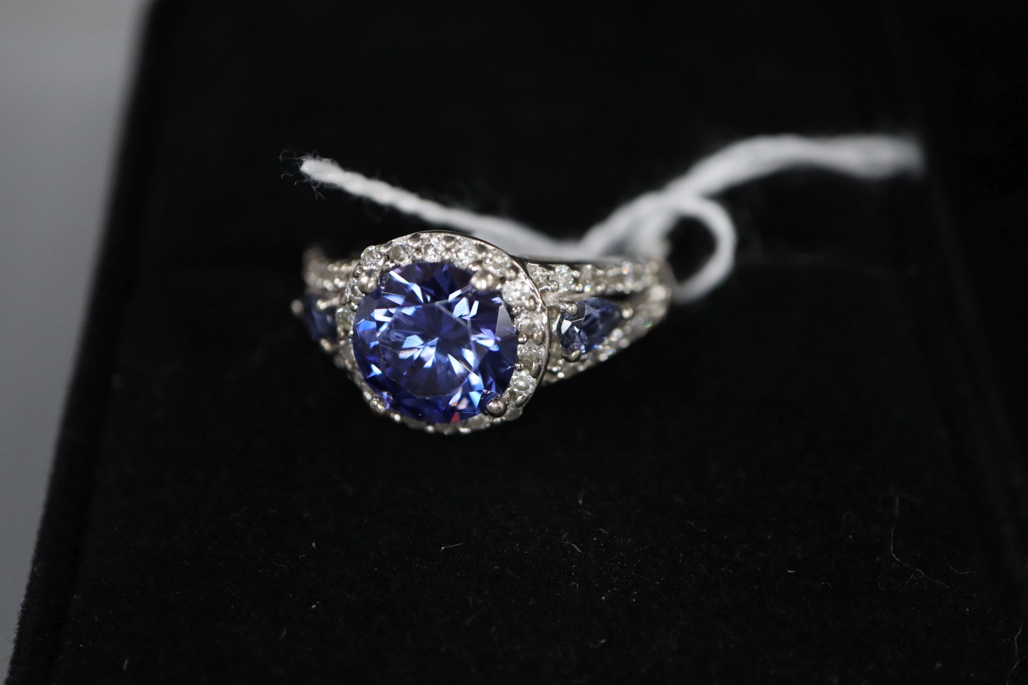 A small collection of jewellery and sundry silver and paste-set jewellery, including two 375 rings and a 9ct chain.
